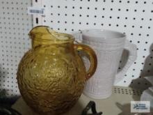 Yellow glass pitcher and Frankoma pitcher. Has crack on the inside. Does not show up on the outside.