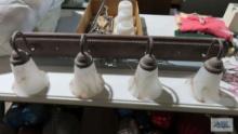 Four light vanity lights and other light shades, towel holders, toilet paper holder, etc
