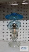 Clear glass oil lamp with blue glass shade