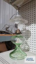 Oil lamp with green glass base and clear glass shade