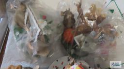 two shelves of mice figurines