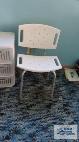 home health care chair and two plastic storage cabinets