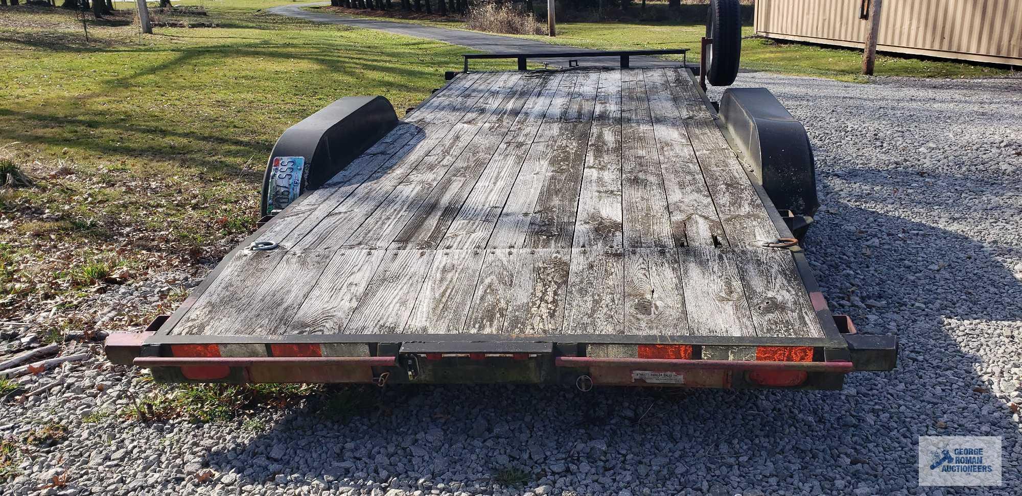 Quality Trailers 2011 car hauler utility trailer with ramps. VIN# 5NDFA1826BS000951. GVWR 7000#. 83