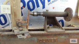 homemade wood lathe on top of vintage Oliver heavy duty table