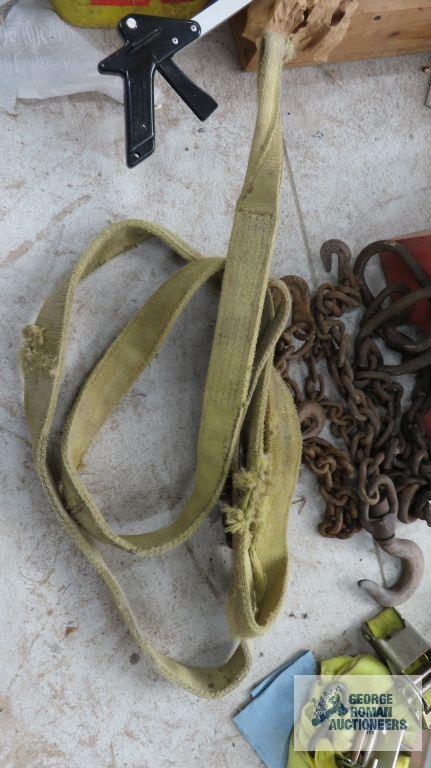 lot of chains and hooks with lifting strap