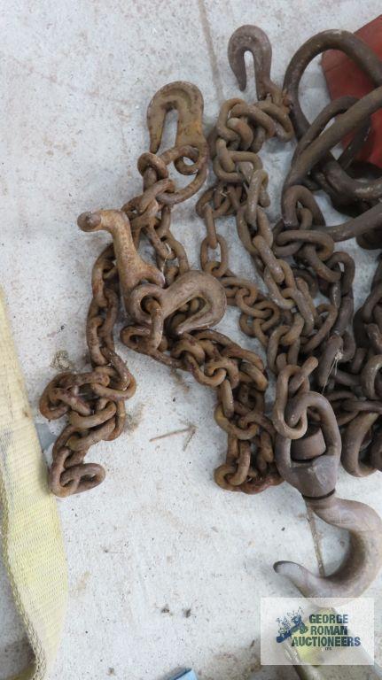 lot of chains and hooks with lifting strap
