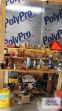 lot of hand tools, solvents, and etc on bench