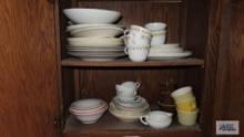 cabinet of assorted dishware