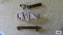 Keychain, string and brass tool