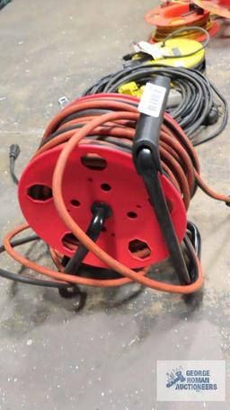 Heavy duty extension cord with freestanding reel