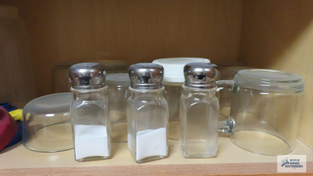 Lot of cups, glasses and dishware in three cabinets