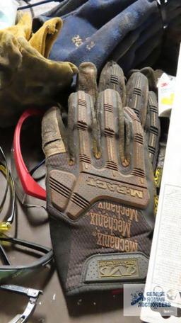 Lot of welding gloves, 30 inch welding jacket, safety glasses, etc