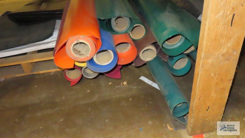 Lot of multicolored rolls of fabric