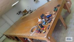 24 ft by 8 ft work table. Bring tools for removal