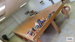 24 ft by 8 ft work table. Bring tools for removal