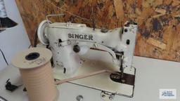 Singer commercial sewing machine with foldable platform