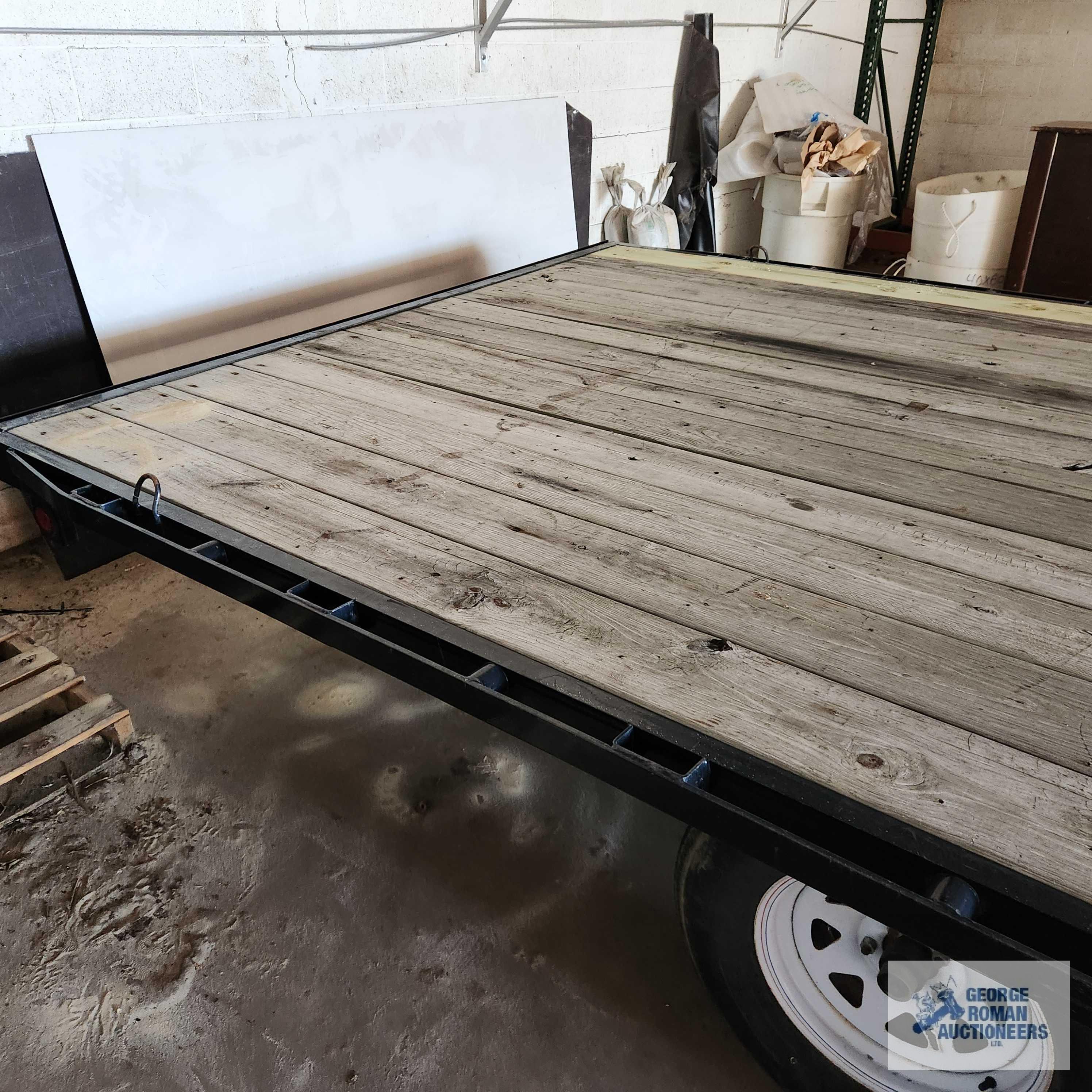 2018 20 ft Load Trail Trailer...Deck is 92-1/2 inch board width. 100-1/2" to the edge of rub rail.