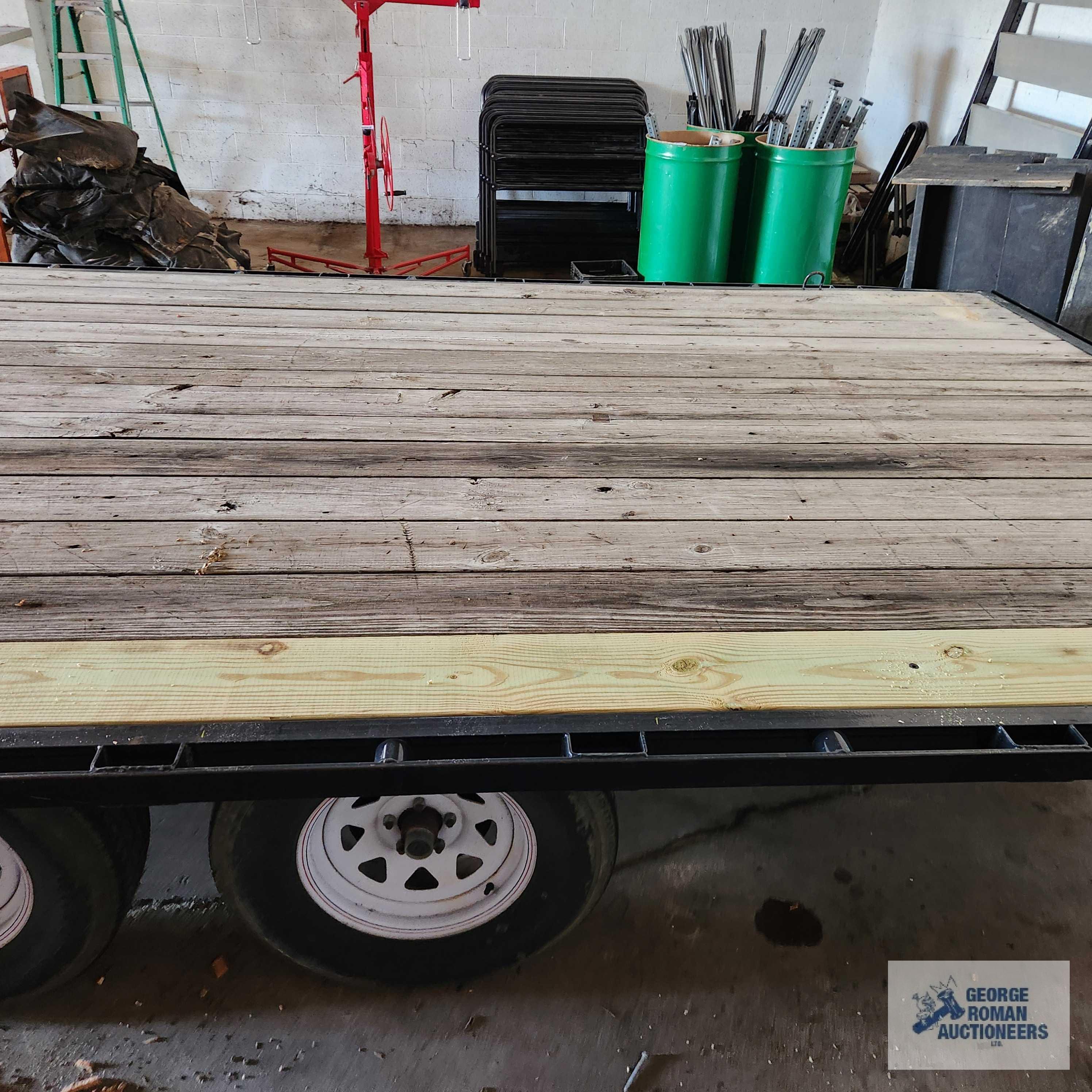 2018 20 ft Load Trail Trailer...Deck is 92-1/2 inch board width. 100-1/2" to the edge of rub rail.