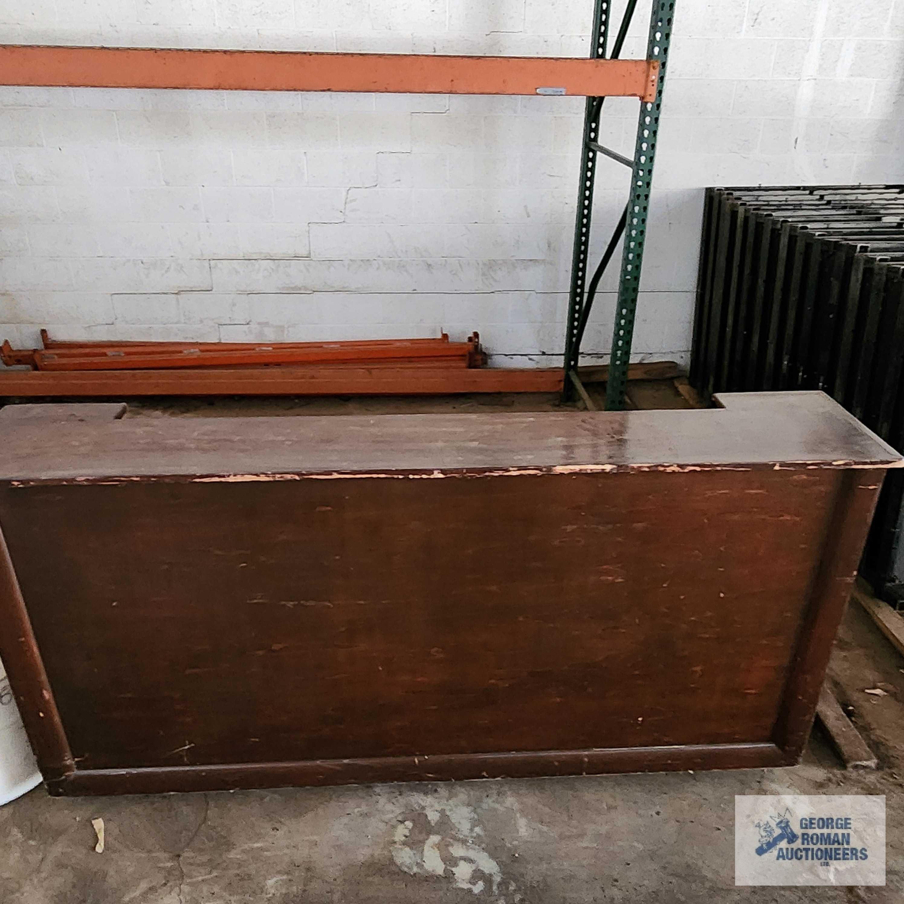 Roll about wooden bar with sink. Approximately 8 ft long