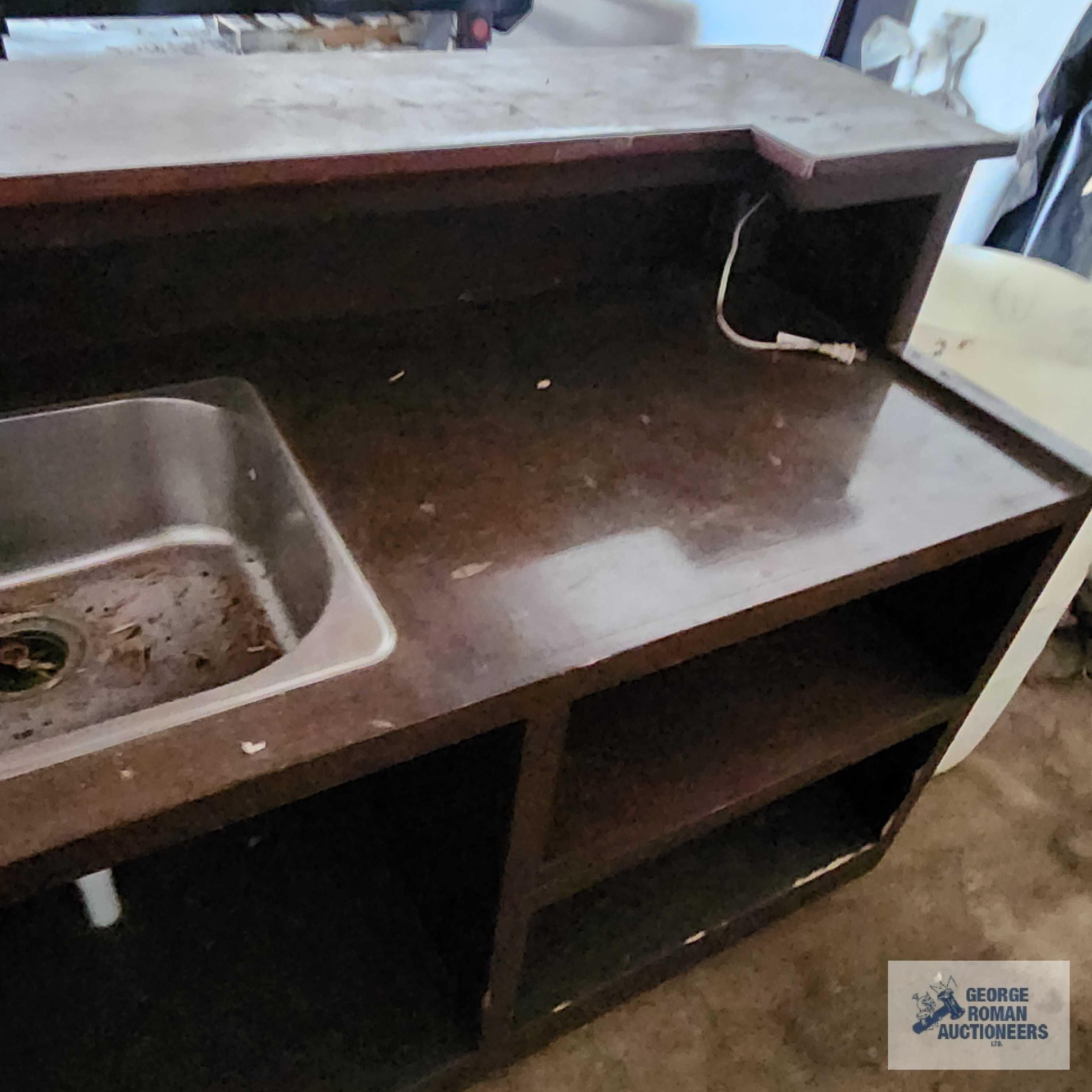 Roll about wooden bar with sink. Approximately 8 ft long