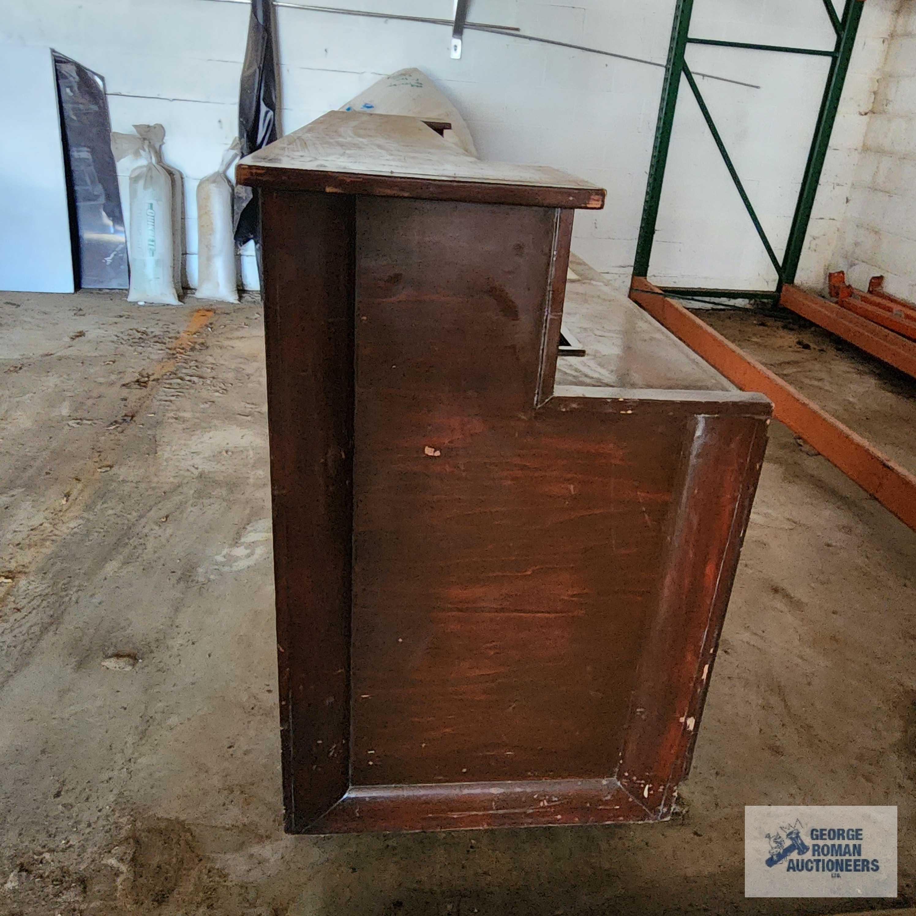 Roll about wooden bar with sink. Approximately 8 ft long