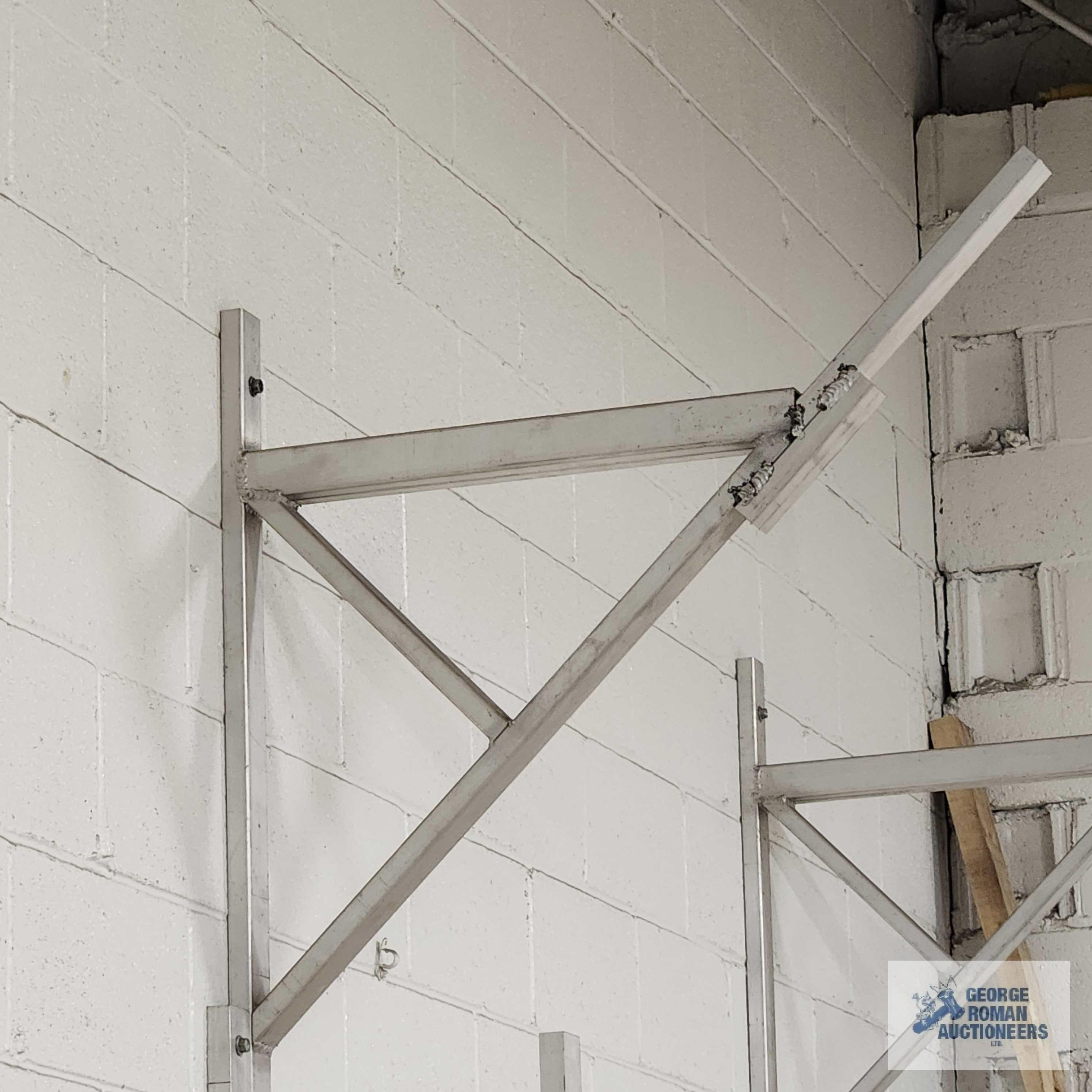 Four aluminum wall brackets with angle stops