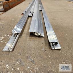 Lot of aluminum pieces. Most are 18 ft long.