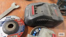 Bosch angle grinder with one battery, charger, cutting and flax wheel and key