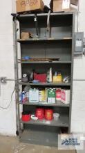 Adjustable metal shelving with vinyl cement, catalyst, cleaner, pencil sharpener and etc