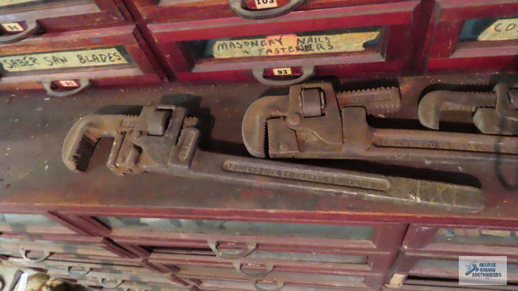 Four vintage pipe wrenches