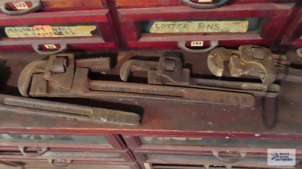 Four vintage pipe wrenches