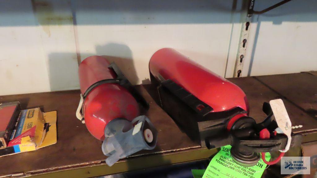 Fire extinguishers and staple gun with staples