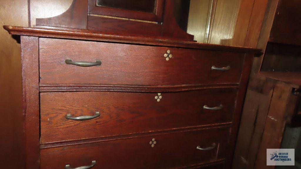 Antique oak chest of drawers with beveled mirror