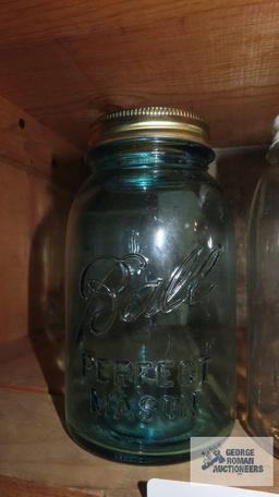 Two antique mason jars