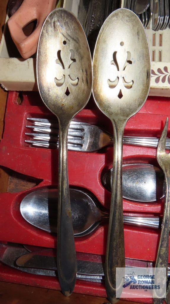 Assorted silverplate flatware and serving utensils