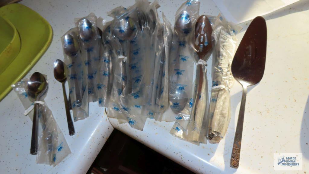 Assorted silverplate flatware and serving utensils