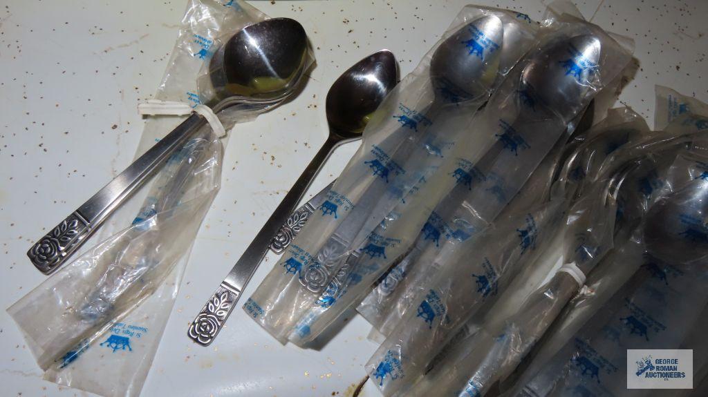 Assorted silverplate flatware and serving utensils