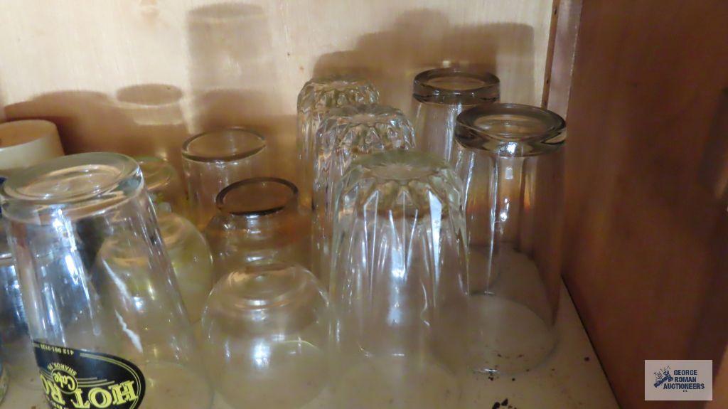 Lot of assorted cups, glasses and etc