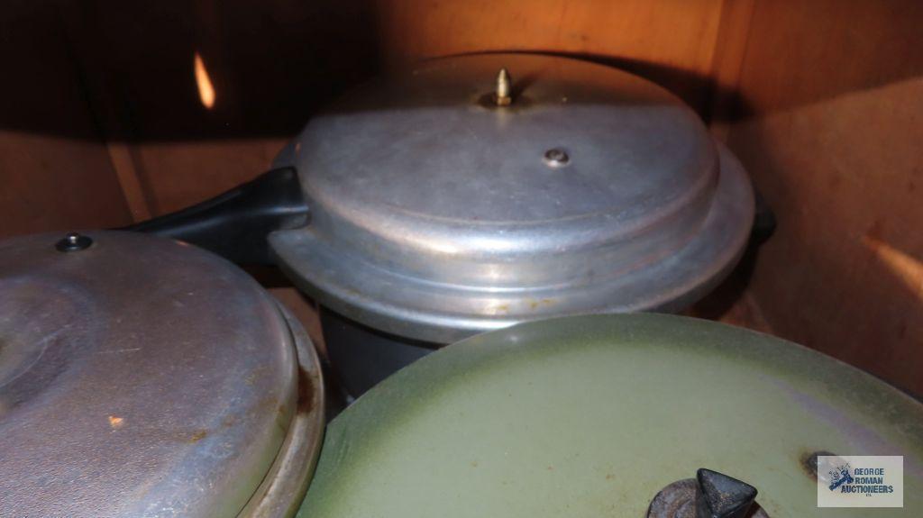 Vintage pressure cookers and roaster