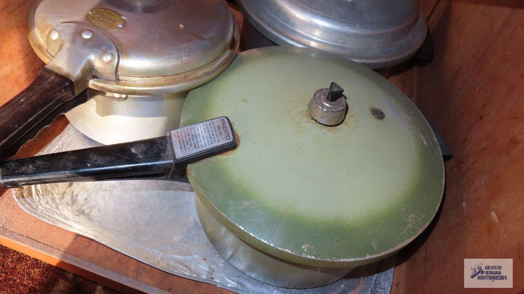 Vintage pressure cookers and roaster