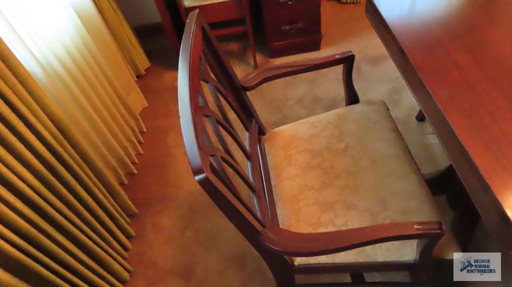 Vintage mahogany dining room table with six chairs and two extra leaves