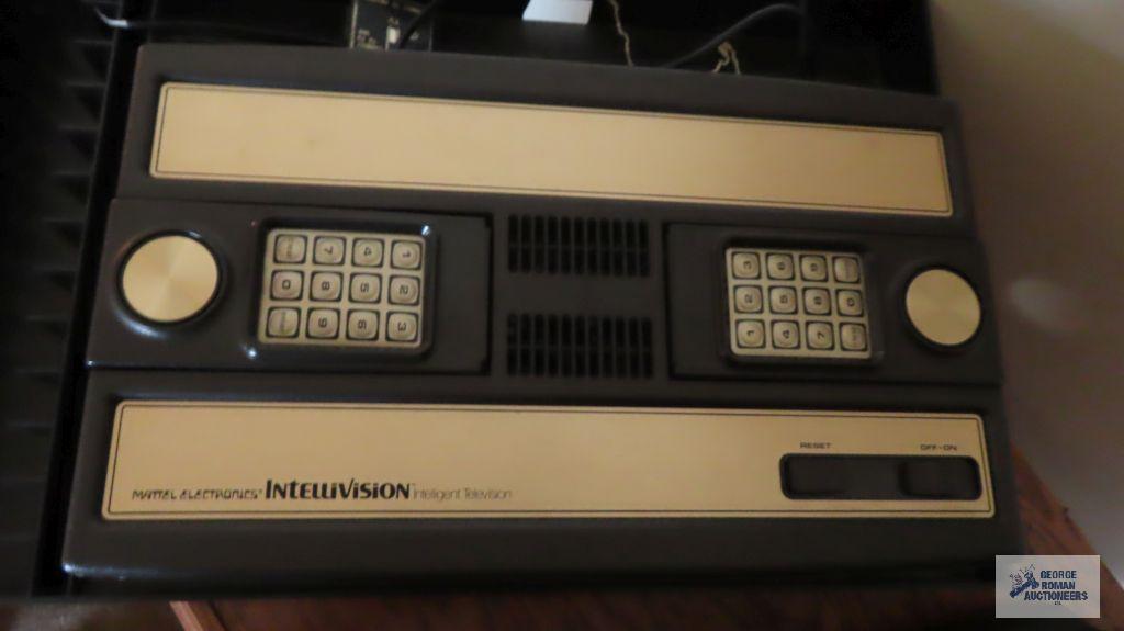 Intellivision gaming system with box. Box is deformed