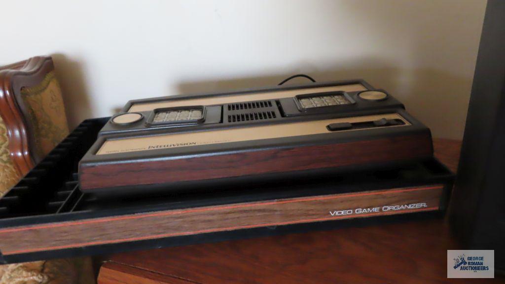 Intellivision gaming system with box. Box is deformed