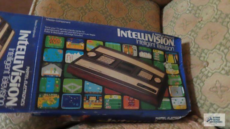 Intellivision gaming system with box. Box is deformed