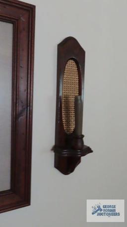 Print with mirror, candle sconce and wall sconce