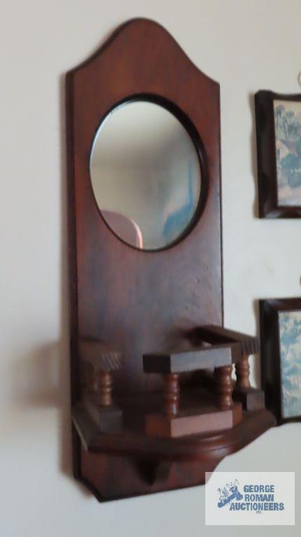Print with mirror, candle sconce and wall sconce