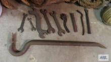 Lot of antique wrenches, chisels and heavy duty crowbar