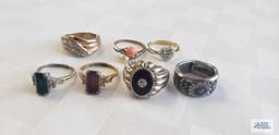 Seven costume jewelry rings