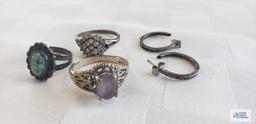 Three gemstone rings, have markings and hoop earrings