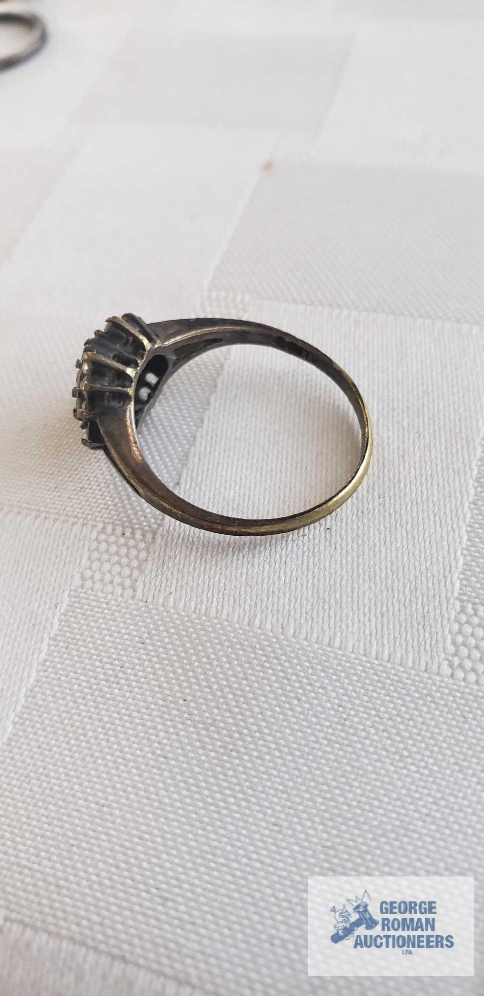 Three gemstone rings, have markings and hoop earrings
